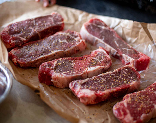 Photo of steaks in butcher paper